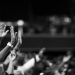 Grayscale Photography Of Hands Waving